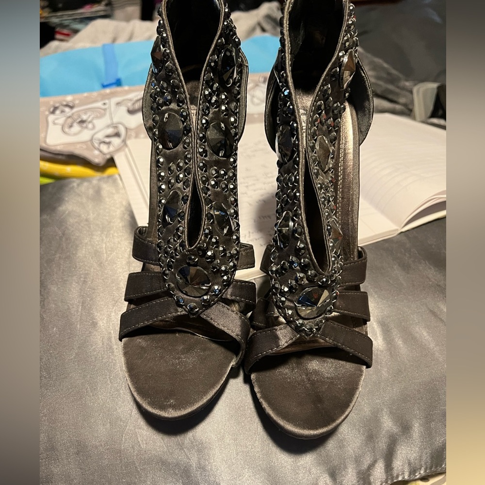 Silver/gray heels with lots of black rhinestone deco